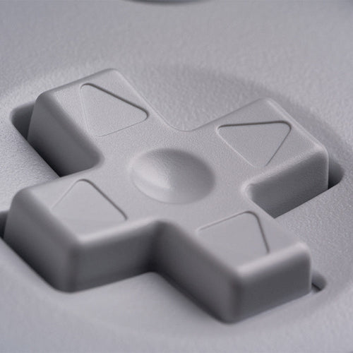 8BitDo 64 Bluetooth – retro-controller, hvid – D-pad i nærbillede