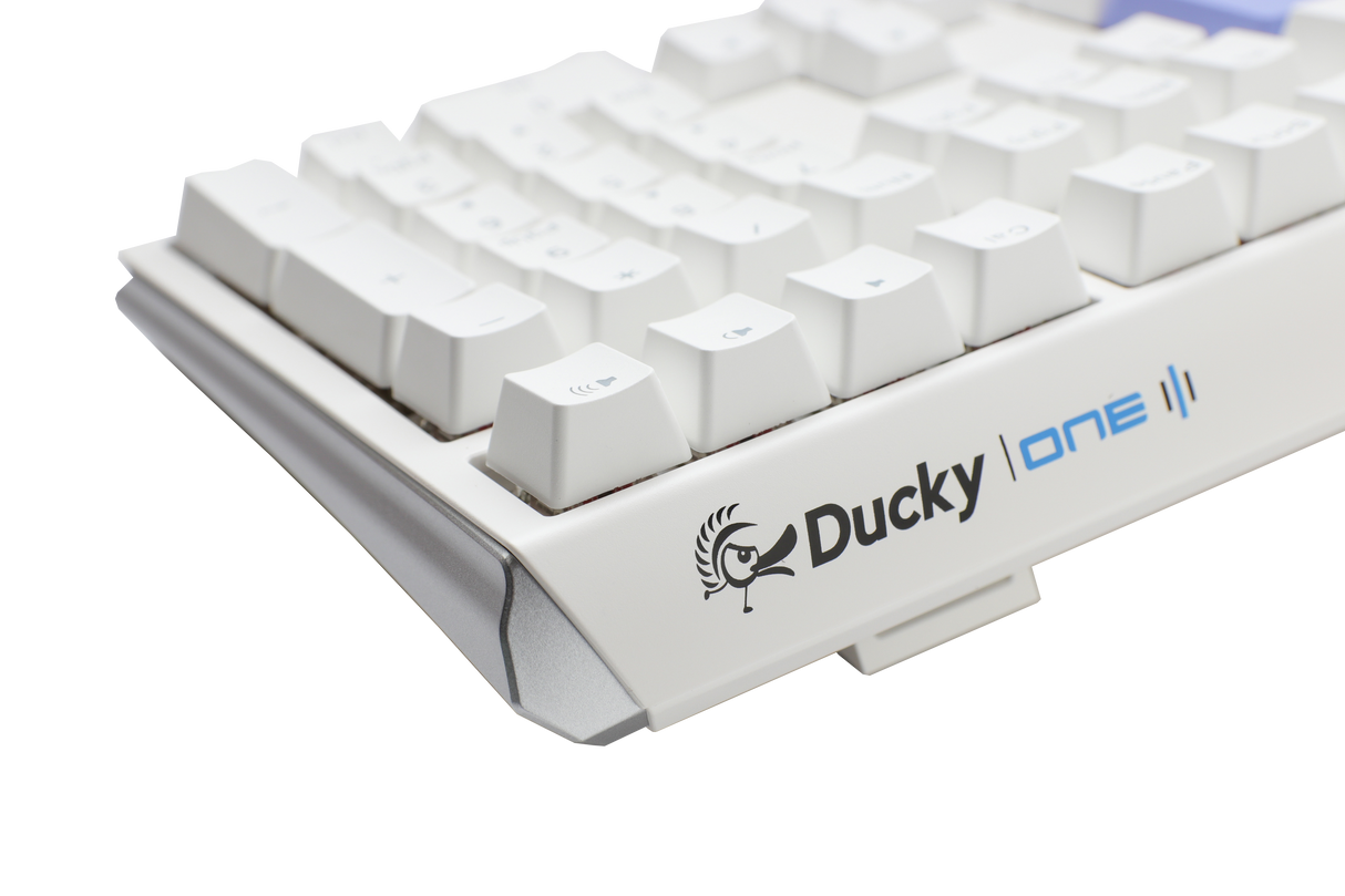 A close-up image of a white mechanical keyboard labeled "Ducky One 3 - Classic Pure White Nordic - Fullsize - Cherry Silent Red", showcasing the keyboard's layout, PBT keycaps, and branding on a light gray background.