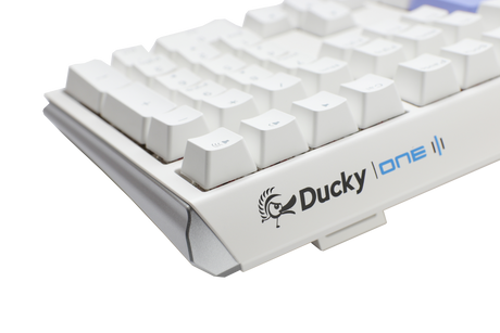 A close-up image of a white mechanical keyboard labeled "Ducky One 3 - Classic Pure White Nordic - Fullsize - Cherry Silent Red", showcasing the keyboard's layout, PBT keycaps, and branding on a light gray background.