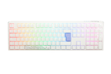 A Ducky mechanical keyboard with multicolored backlit keys, ranging from red through the spectrum to purple, featuring double-shot PBT keycaps and a custom white casing with a floral design on the bottom right.