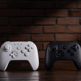 8BitDo 64 Bluetooth – retro-controller, hvid – Hvid og sort variant som illustration