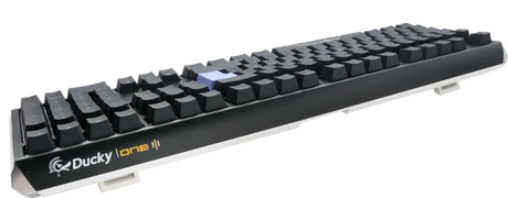 A Ducky One 3 - Classic Black / White Nordic - Fullsize - Cherry Silent Red mechanical keyboard with black keycaps and a sleek, elongated design on a white background.