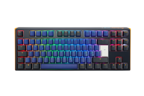 A compact mechanical keyboard with a colorful backlit design featuring rainbow hues across the PBT keycaps, isolated on a white background. The Ducky One 3 - Horizon Nordic - TKL - Cherry Blue.