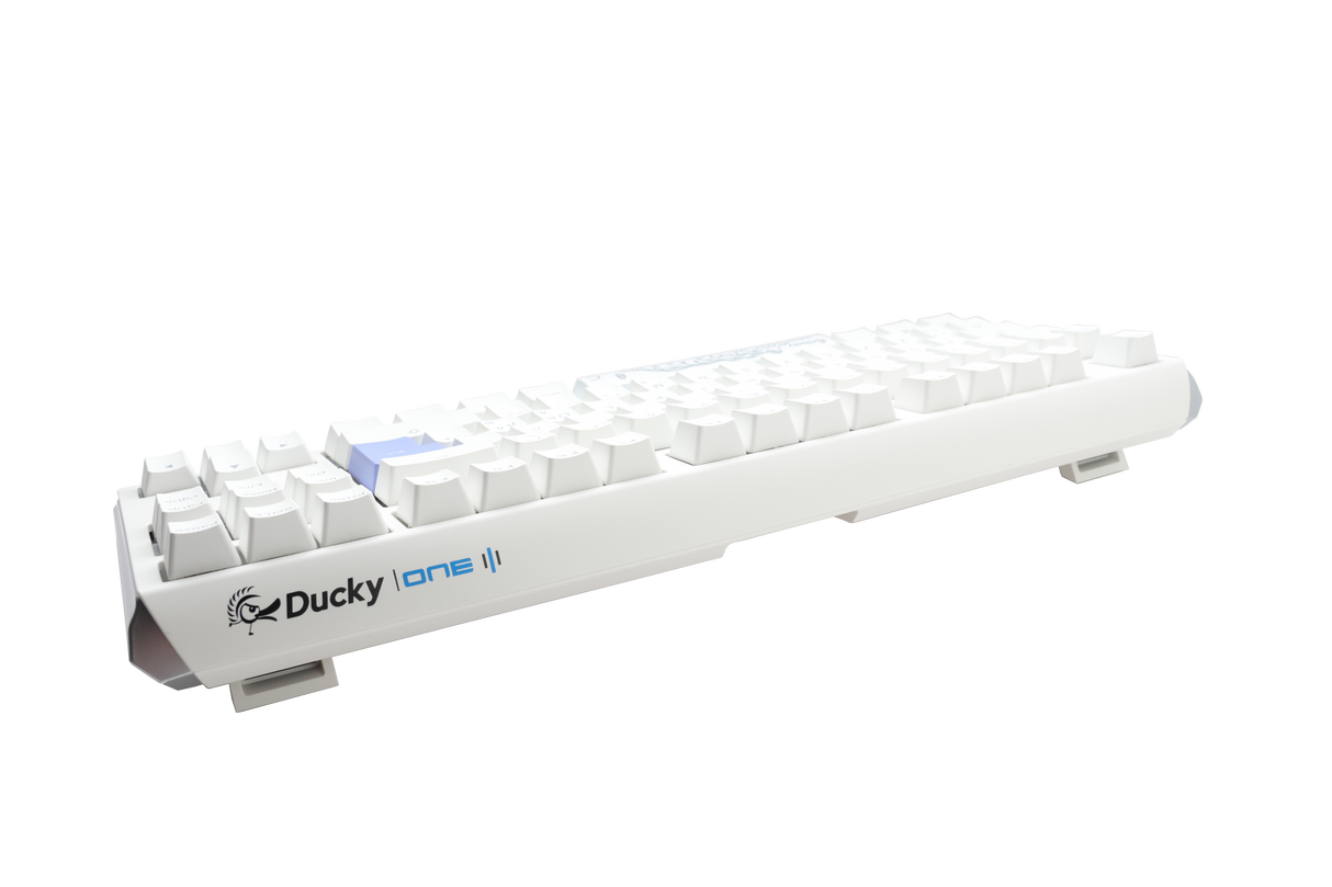 A white Ducky One 3 - Pure White Nordic - TKL - Cherry Red mechanical keyboard with raised PBT keycaps and the Ducky logo on the bottom right, set against a white background.